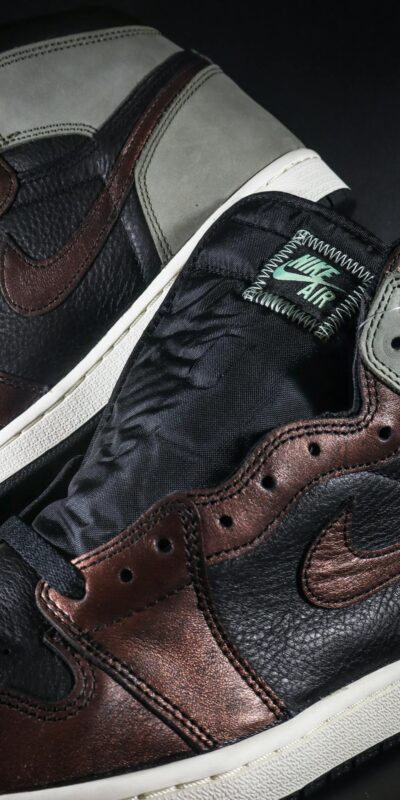 Detailed view of leather sneakers highlighting texture and design.