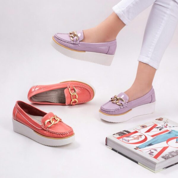 Elegant moccasins in vibrant coral and lilac with a modern design.